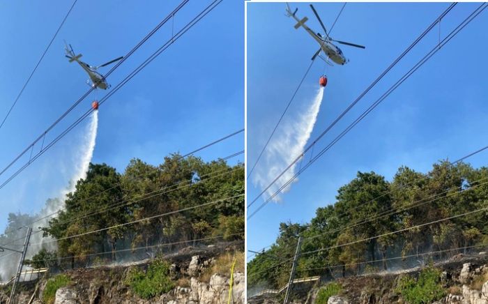Domato l'incendio a Medeazza dopo 30 lanci d'acqua da parte dell'elicottero della Protezione Civile