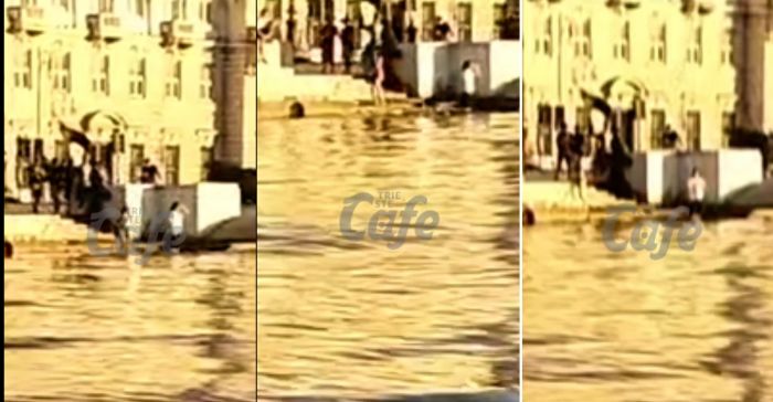 Turisti sfidano i divieti, tuffi e bagni vietati davanti piazza Unità: triestini stufi e scocciati! (VIDEO)
